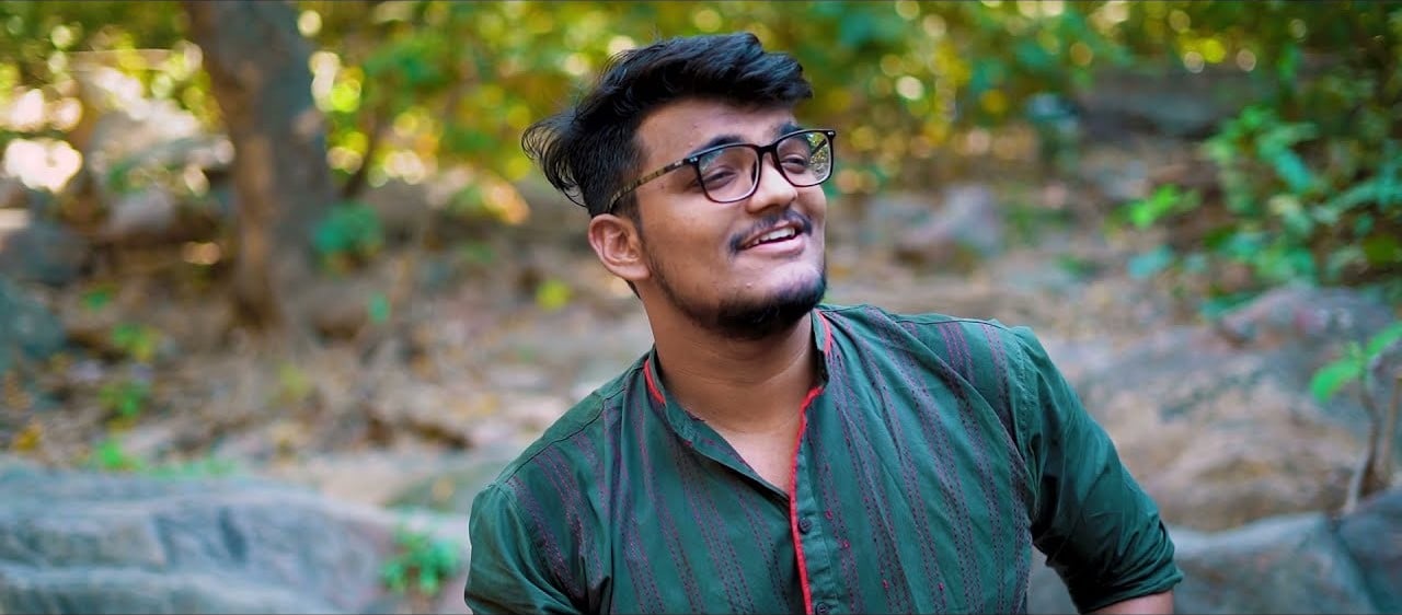 JP Kalaravkar in a green kurta outdoors among trees, from his Jai Jai Kedara cover